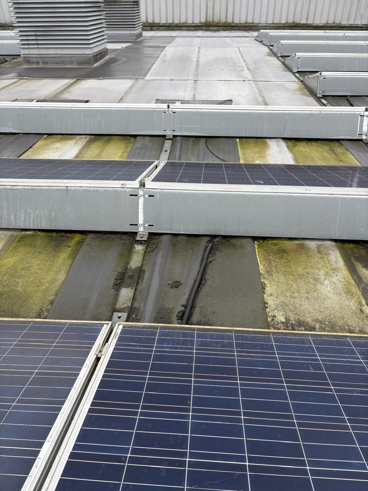 Corroded and rusted solar panel mounting clamp