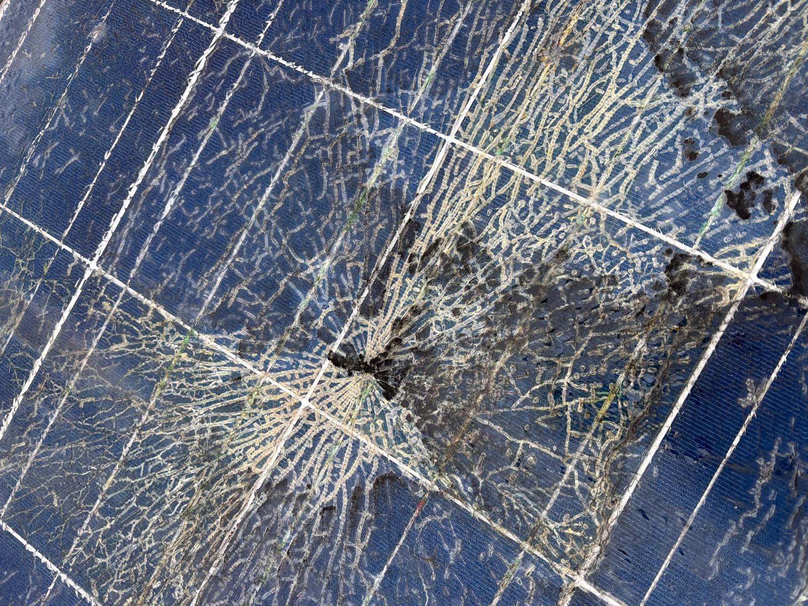 Shattered solar panel — impact damage and cell failure